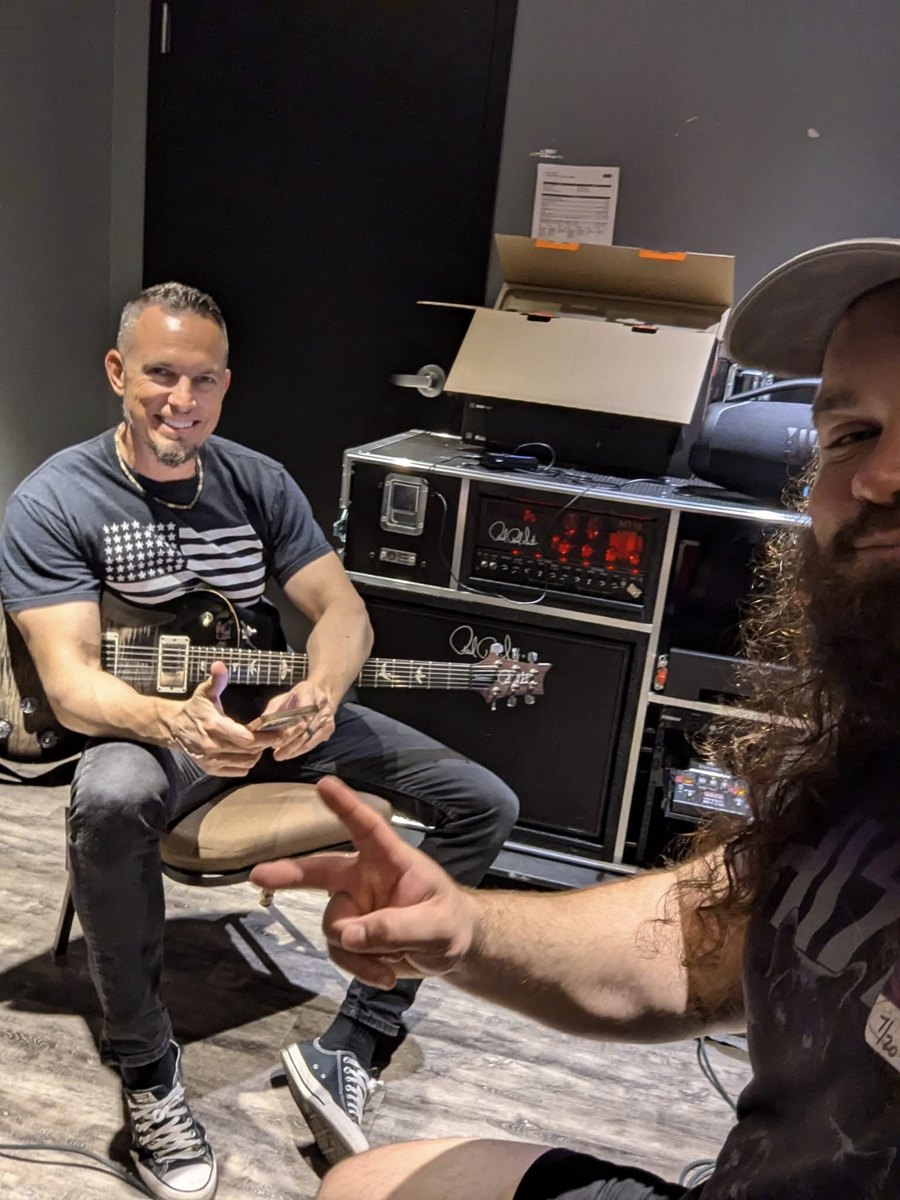Zach Adkins with Mark Tremonti backstage